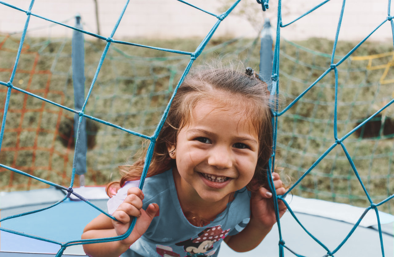 Young Girl Playing Outdoors