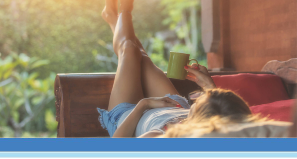 women laying down with coffee