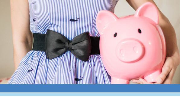 woman holding piggy bank