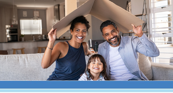 mom dad and daughter under card board roof